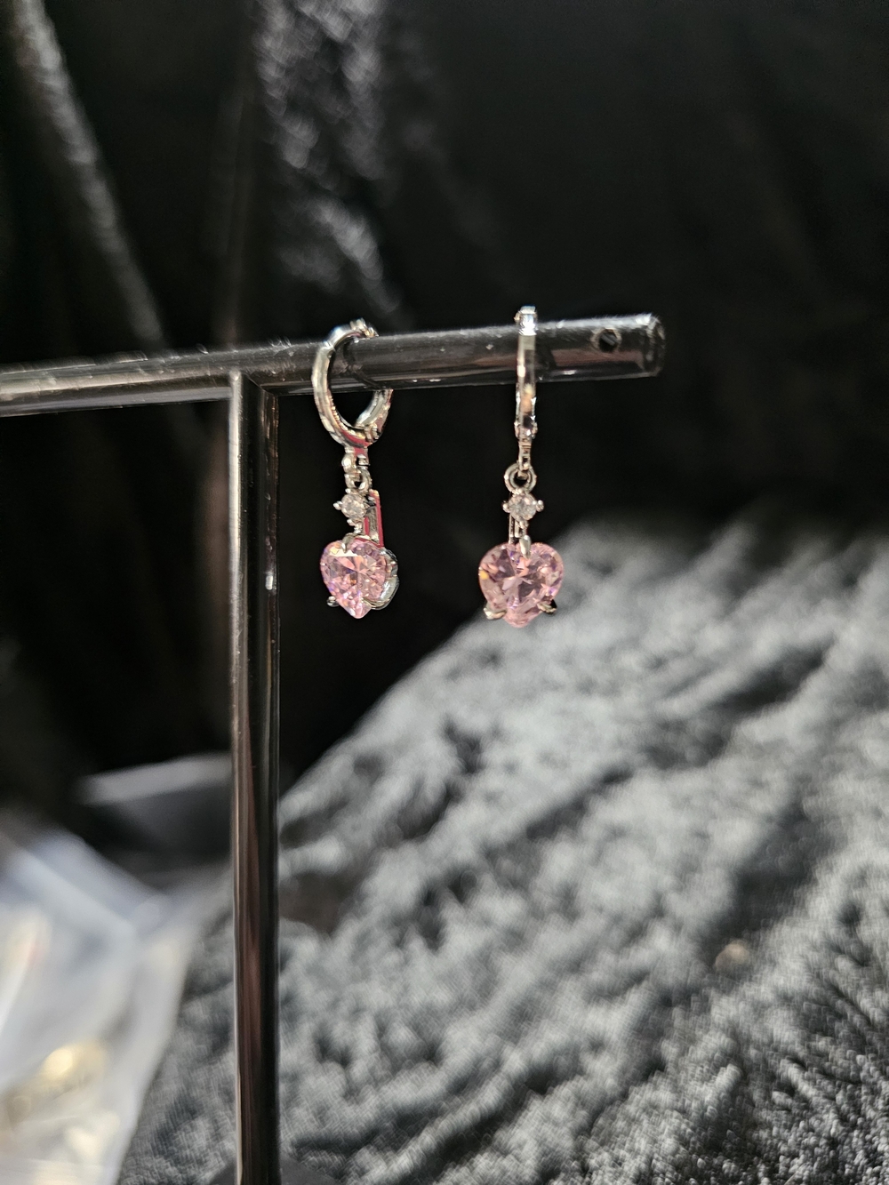 Silver Hoop Huggie Earrings with Pink Heart Crystal Drops.